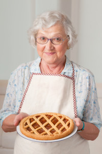 Senior lady with homemade cake